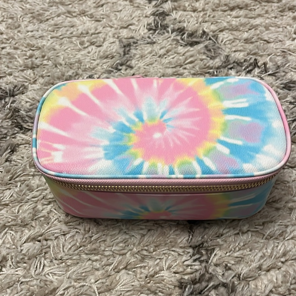 Stoney Clover Lane printed textured mirror open top pouch. Pastel tie dye. New.